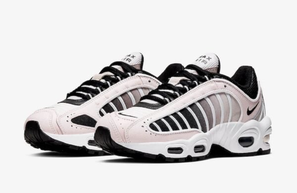a pair of white and black sneakers