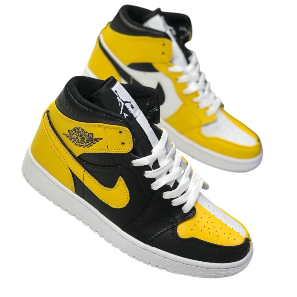 a pair of yellow and black shoes