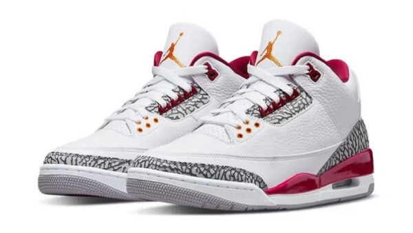 a pair of white and red shoes
