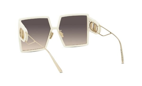 a pair of sunglasses with a white frame